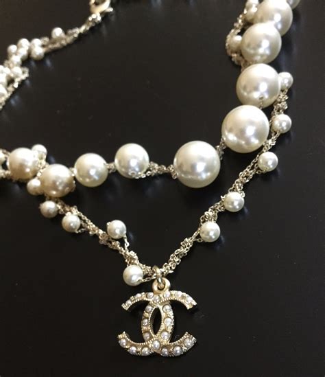 chanel crystal cc pendant necklace|long Chanel necklace with pearls.